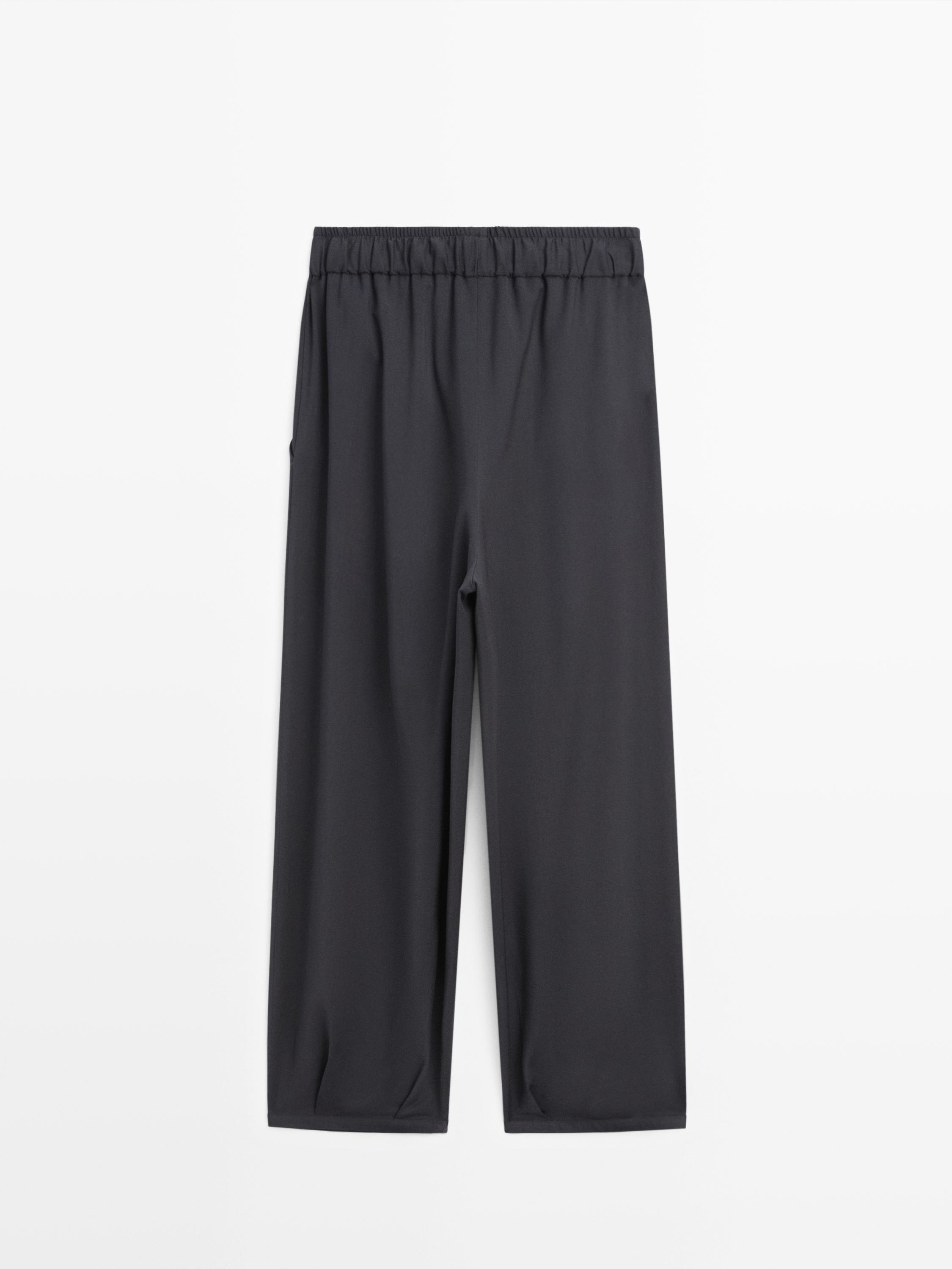 Pantalon large volume à plis